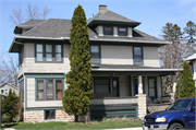 165 6TH ST, a American Foursquare house, built in Fond du Lac, Wisconsin in 1910.