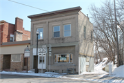 31 E MILL ST, a Italianate small office building, built in Plymouth, Wisconsin in 1914.