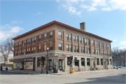 301-307 E Mill St, a Twentieth Century Commercial retail building, built in Plymouth, Wisconsin in 1906.