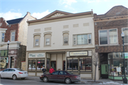 407-409 E Mill St, a Italianate retail building, built in Plymouth, Wisconsin in 1915.