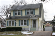 129 W NEWHALL AVE, a Dutch Colonial Revival house, built in Waukesha, Wisconsin in 1923.