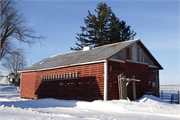 28768 STH 27, a Astylistic Utilitarian Building corn crib, built in Eastman, Wisconsin in 1900.