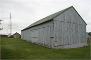 10000 CTH F, a Astylistic Utilitarian Building machine shed, built in Fulton, Wisconsin in 1890.