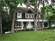1030 S MONROE AVE, a Dutch Colonial Revival house, built in Green Bay, Wisconsin in 1906.