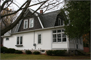 911 W ELM ST, a Dutch Colonial Revival house, built in Sturgeon Bay, Wisconsin in 1909.