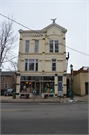 1115-1117 E BRADY ST, a Queen Anne retail building, built in Milwaukee, Wisconsin in 1888.