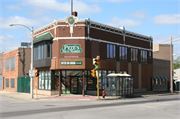 1407-1409 S MUSKEGO AVE, a Prairie School retail building, built in Milwaukee, Wisconsin in 1922.