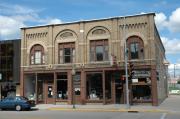 148, 150, 152 E 2ND ST, a Romanesque Revival blacksmith shop, built in Kaukauna, Wisconsin in 1889.