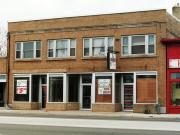 1350-1354 MAIN ST, a Commercial Vernacular retail building, built in Green Bay, Wisconsin in 1924.