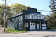 609 WASHINGTON ST, a Commercial Vernacular blacksmith shop, built in Wrightstown, Wisconsin in 1922.