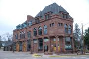 1 E BAYFIELD ST, a Romanesque Revival bank/financial institution, built in Washburn, Wisconsin in 1890.