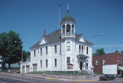 BENNET AVE, E, 102, AT MAIN ST, NE CNR, a Queen Anne city hall, built in Mellen, Wisconsin in 1896.
