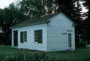 2640 S WEBSTER AVE (HERITAGE HILL STATE PARK), a Greek Revival small office building, built in Allouez, Wisconsin in 1835.