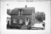 1004 DOUSMAN ST, a Dutch Colonial Revival house, built in Green Bay, Wisconsin in 1905.