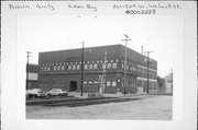 201-209 W WALNUT ST, a Commercial Vernacular automobile showroom, built in Green Bay, Wisconsin in 1916.