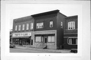 113 W PULASKI ST, a Commercial Vernacular retail building, built in Pulaski, Wisconsin in 1900.
