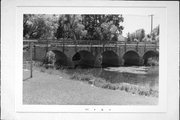 WEEKS RD, OVER PINE CREEK, 200 FT N OF CENTER ST, a NA (unknown or not a building) stone arch bridge, built in Charlestown, Wisconsin in 1901.