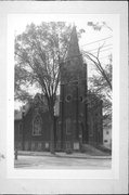 1800 JACKSON ST, SE CNR OF JACKSON AND 18TH, a Late Gothic Revival church, built in Bloomer, Wisconsin in 1909.
