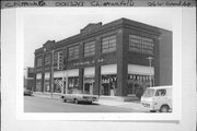 26 W GRAND AVE, a Commercial Vernacular automobile showroom, built in Chippewa Falls, Wisconsin in 1924.