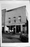 118 E 5TH ST, a Commercial Vernacular retail building, built in Neillsville, Wisconsin in .