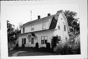 4 HEWETT ST, a Dutch Colonial Revival house, built in Neillsville, Wisconsin in .