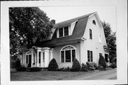 208 HEWETT ST, a Dutch Colonial Revival house, built in Neillsville, Wisconsin in .