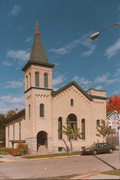 233 W HOWARD ST, a Romanesque Revival church, built in Portage, Wisconsin in 1871.