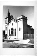 233 W HOWARD ST, a Romanesque Revival church, built in Portage, Wisconsin in 1871.