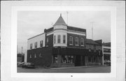 129 W Blackhawk Ave, a Queen Anne retail building, built in Prairie du Chien, Wisconsin in 1900.