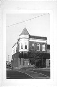 129 W Blackhawk Ave, a Queen Anne retail building, built in Prairie du Chien, Wisconsin in 1900.