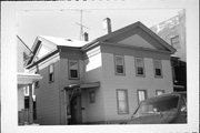 84 HARRISON PL, a Greek Revival duplex, built in Fond du Lac, Wisconsin in 1860.