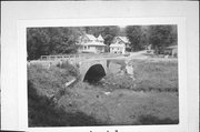 Bluff St. at Sanders Creek, a NA (unknown or not a building) stone arch bridge, built in Boscobel, Wisconsin in 1913.