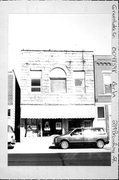 219 BROADWAY, a Romanesque Revival retail building, built in Berlin, Wisconsin in 1890.