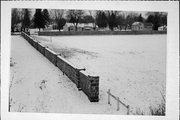 BEHIND 289 E HURON ST, a NA (unknown or not a building) wall, built in Berlin, Wisconsin in .
