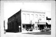 139-139A-141-141A W HURON ST, a Italianate retail building, built in Berlin, Wisconsin in 1870.