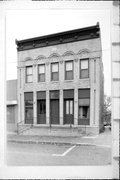 145-147 N MONROE ST, a Commercial Vernacular retail building, built in Waterloo, Wisconsin in 1883.
