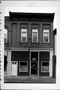 9 E MAIN ST, a Italianate retail building, built in Watertown, Wisconsin in 1879.