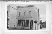 605 E MAIN ST (MOVED TO 208 S 1ST ST), a Italianate grocery, built in Watertown, Wisconsin in 1885.