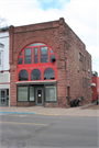 311 MAIN ST E, a Romanesque Revival retail building, built in Ashland, Wisconsin in 1890.