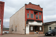 617 MAIN ST E, a Romanesque Revival retail building, built in Ashland, Wisconsin in 1890.