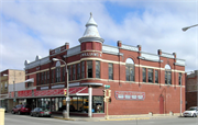 125 S WATER ST, a Romanesque Revival retail building, built in Sparta, Wisconsin in 1896.