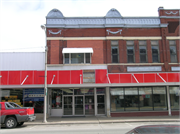 125 S WATER ST, a Romanesque Revival retail building, built in Sparta, Wisconsin in 1896.