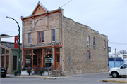 118-120 W LAKE ST, a Commercial Vernacular tavern/bar, built in Lake Mills, Wisconsin in 1890.
