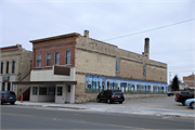 203 N MAIN ST, a Commercial Vernacular retail building, built in Lake Mills, Wisconsin in 1895.