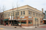 324-330 W WASHINGTON ST, a Commercial Vernacular retail building, built in Wausau, Wisconsin in 1910.