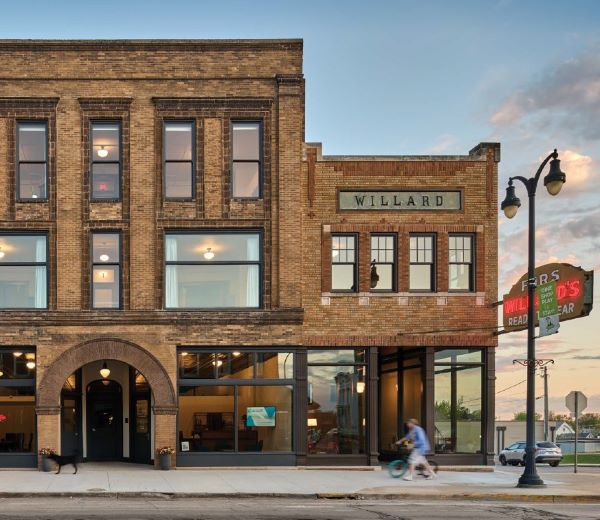 Image of an older brick building that says "Willard" on the outside