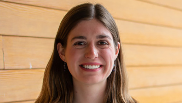 Headshot of Mallory Hanson with shoulder length brown hair and a soft smile.