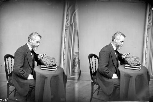Stereograph portrait of Increase Allen Lapham (1811-1875) examining the sixth fragment of a 33 lb. meteorite found in Trenton, Washington County, Wisconsin in 1871.