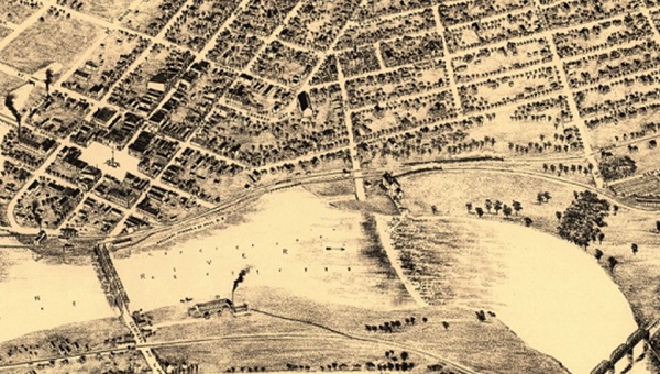 A yellowish map with black pen drawing shows waterways, roads, and structures in historic Stevens Point