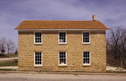 Cleveland's Hall and Blacksmith Shop, a Building.